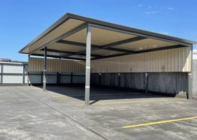 Stratco Outback Flat Carport with Outback Roof Sheet partial side walls 